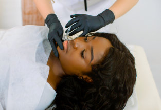 woman doing facial