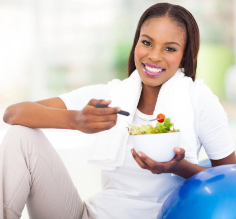 womam eating salad
