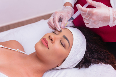 young woman getting rejuvenating injections