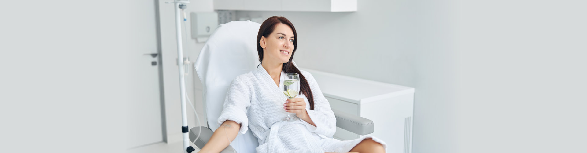a happy woman smiling while taking therapy